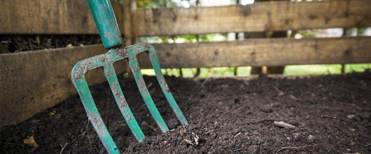 black-composted-soil-in-compost-bin-f1439e2f